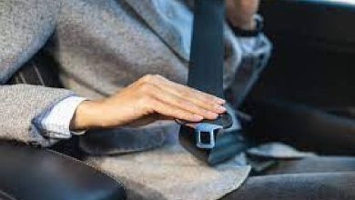 Denial of vehicle fitness certificate without 'seatbelt'?