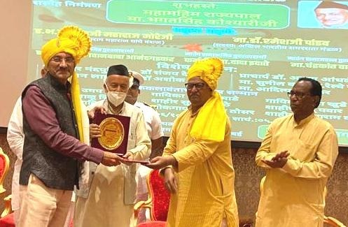 Rajan Lakhe honored by the Governor for his contribution in the field of literature