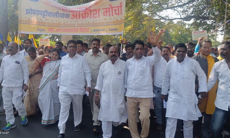 A protest march of slum dwellers led by Bhagwan Rao Vairat, President of the Slum Security Force