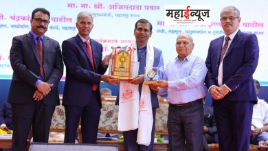 Principal from Savitribai Phule Pune University Dr. Manohar Patil honored