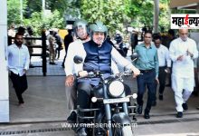 Chief Minister Devendra Fadnavis arrives at the Vidhan Bhavan on a bike.