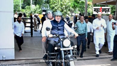 Chief Minister Devendra Fadnavis arrives at the Vidhan Bhavan on a bike.
