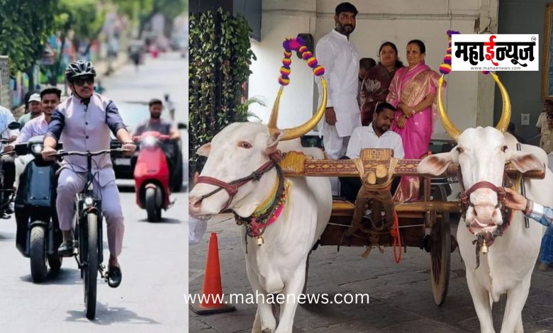 Mayor Ravi Landge and Commissioner Dr. Vijay Suryavanshi arrive at the Municipal Corporation building on bicycles.